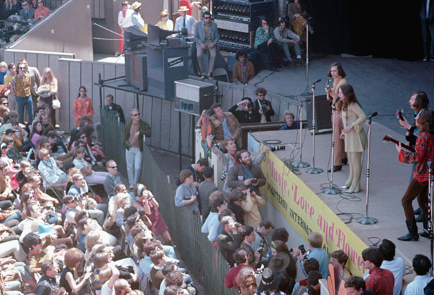 June 1967, Monterey, California, USA --- Janis Joplin with the guitarists of Big Brother and the Holding Company, on stage at the Monterey Pop Festival. The fame garnered from this performance caused Joplin to leave the band about a year later. --- Image by © Ted Streshinsky/CORBIS